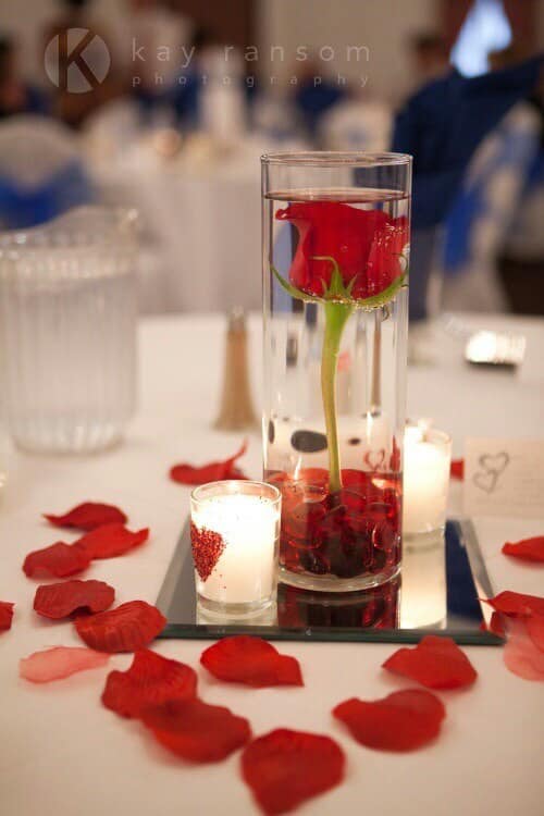 red rose in glass bowl